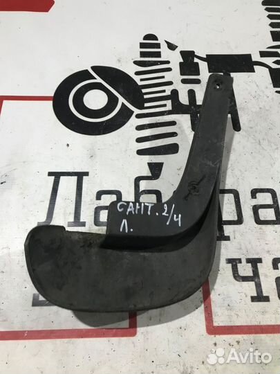 Брызговик задний левый Hyundai Santa Fe II рестайлинг (2010—2012)