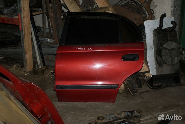 Задняя левая дверь Toyota Carina E вишн металлик