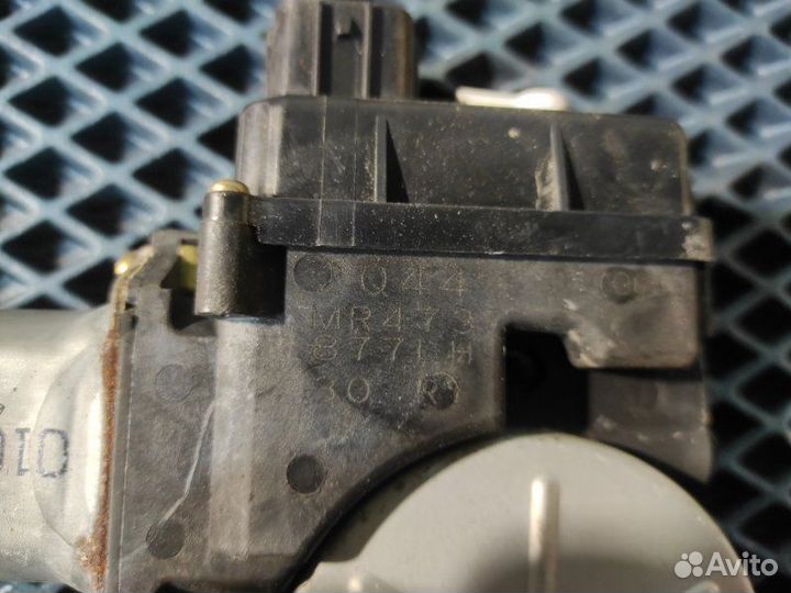 Мотор стеклоподъемника задний левый Mitsubishi