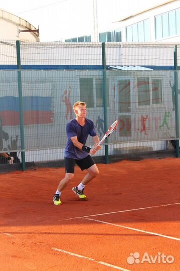 Тренер по большому теннису