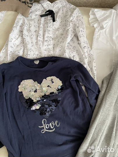 Два пакета вещей от 122 до 134 см