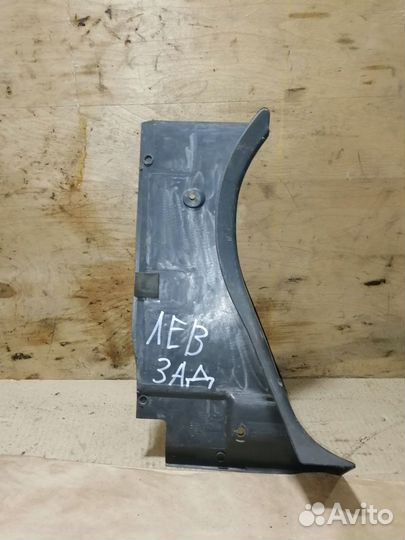 Обшивка багажника лево Митсубиси Лансер 8