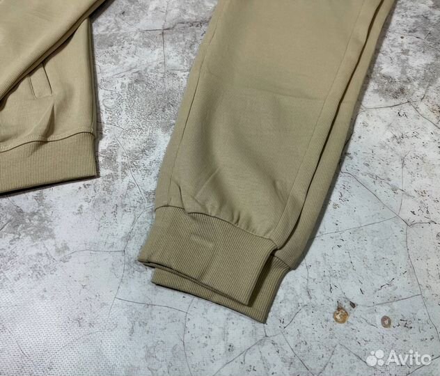 Спортивные костюмы Lacoste