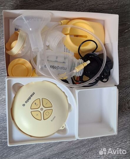 Молокоотсос medela swing электрический