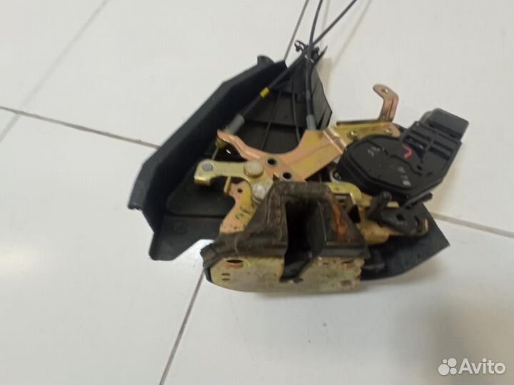 Замок двери задней левой Geely MK