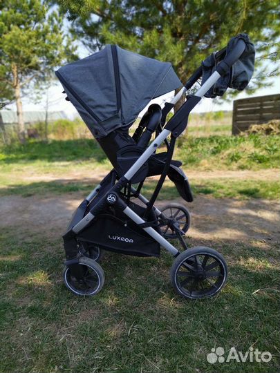 Прогулочная коляска с реверсивным блоком