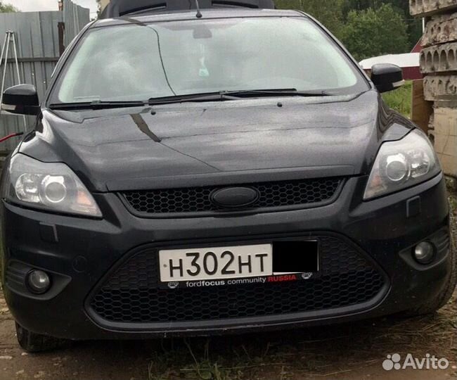 Наклейки на эмблемы черные Ford Focus