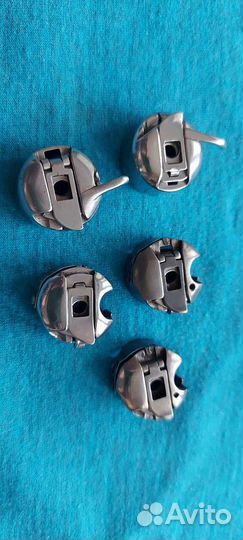 Шпульный колпачок