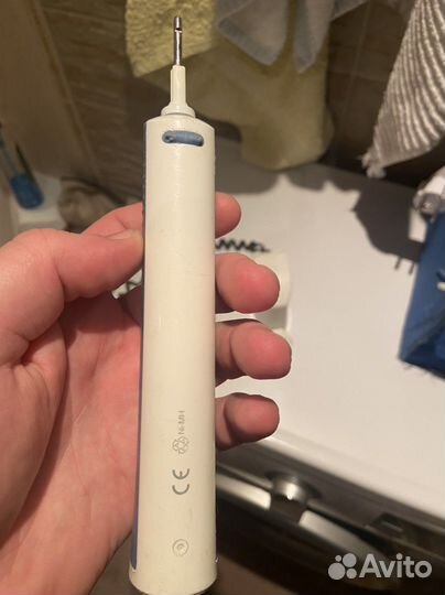 Электрическая зубная щетка