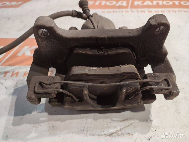 Суппорт перед. лев. Volkswagen Tiguan 2008