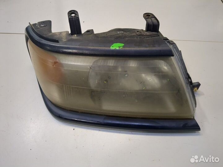 Фара (передняя) Mitsubishi Montero Sport / Pajero