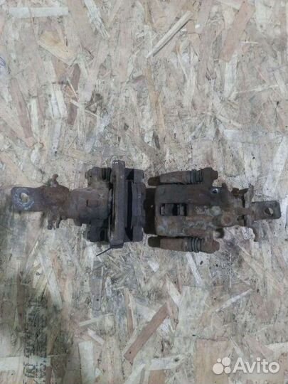 Суппорт задний Nissan Almera N16 2002-2006