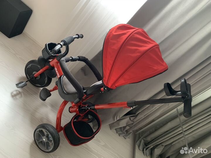 Трехколесный велосипед с ручкой