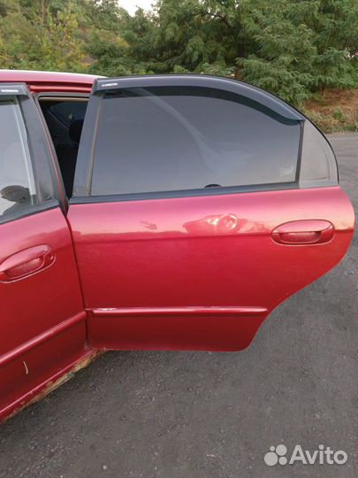 Двери Kia Spectra 1.6л AT 2004