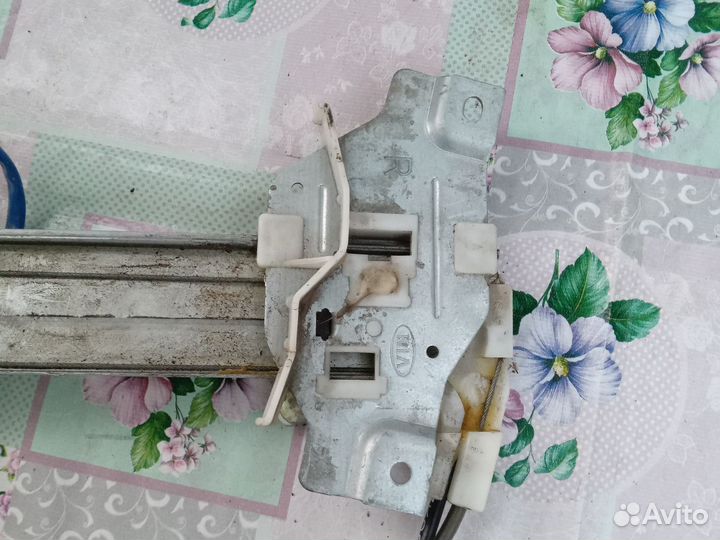 Стеклоподъемник на kia spectra