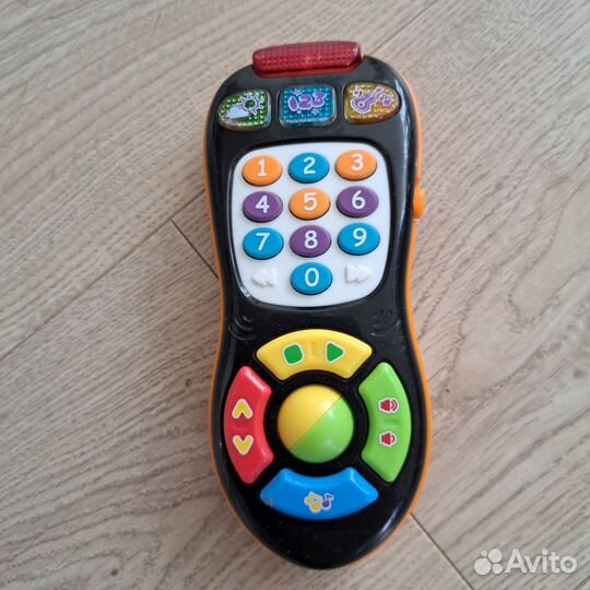Музыкальный телефон игрушка
