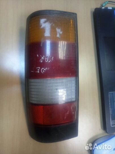 Фонарь лев. opel Kadett