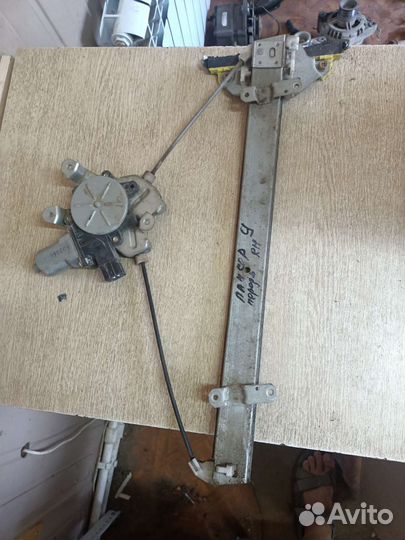 Mitsubishi lancer 9 стеклопадьемник перед правый