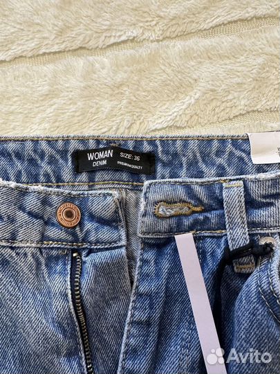 Новые джинсы с биркой