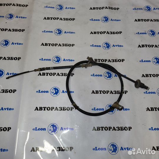 Трос стояночного тормоза левый Hyundai Accent 3