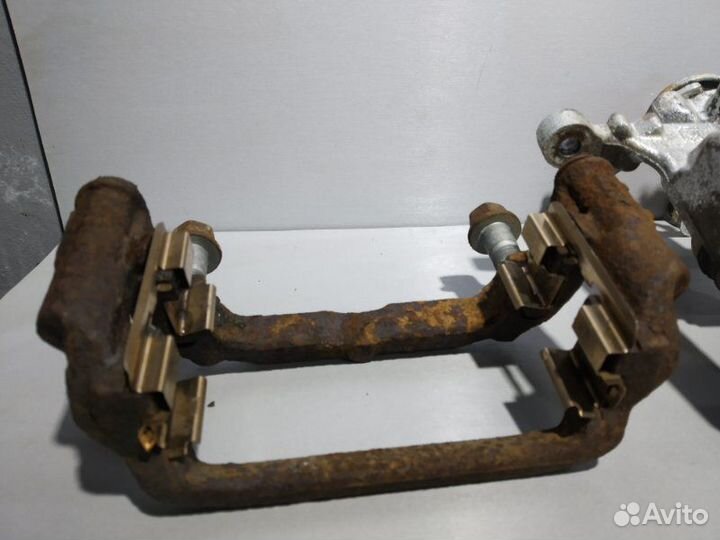 Суппорт задний левый Opel Astra J хэтчбек A14NET