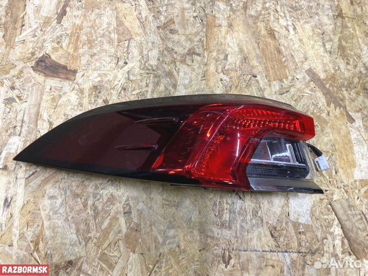 Фонарь Тойота Королла Е210 наружный левый