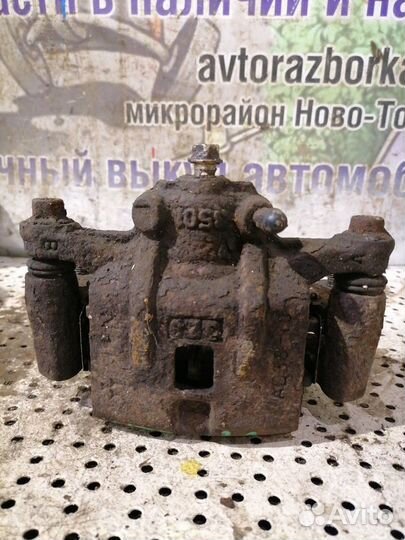 Суппорт задний левый Mazda Xedos 9