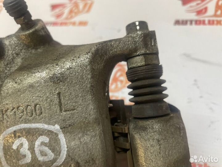 Суппорт тормозной передний левый Mazda 3 BM