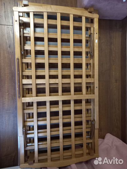 Детская кроватка с продольным маятником