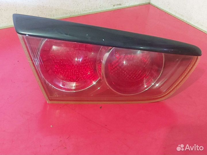 Фонарь задний левый в крышку Mitsubishi lancer 10