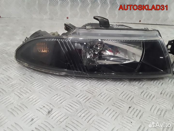 Фара левая правая Mitsubishi Carisma DA MR972793