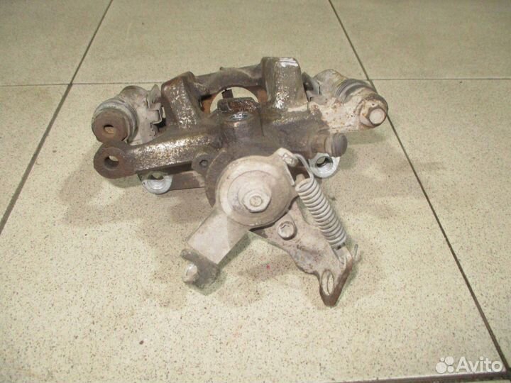 Суппорт задний левый Opel Zafira C