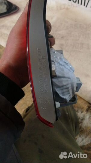 Фонарь в крышку багажника Тойота Королла Е150