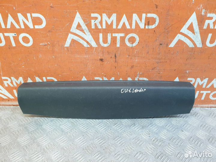 Обшивка двери багажника верхняя Mitsubishi