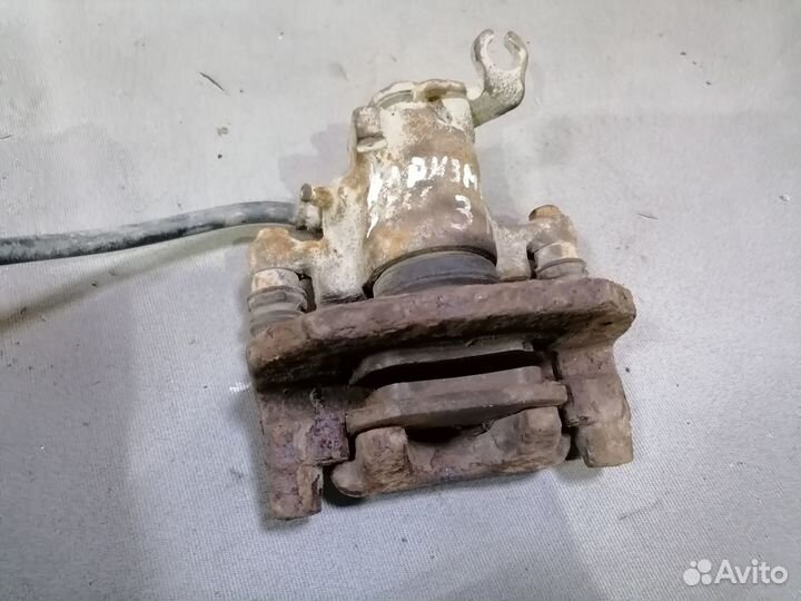 Суппорт задний правый Mitsubishi Carisma