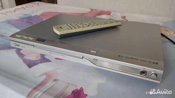 DVD/VCD/CD плеер с караоке LG