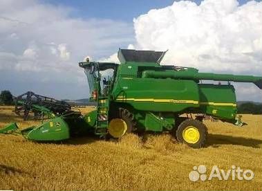 На разборке сельхозтехника John Deere