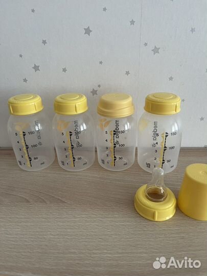 Молокоотсос medela swing maxi & calma