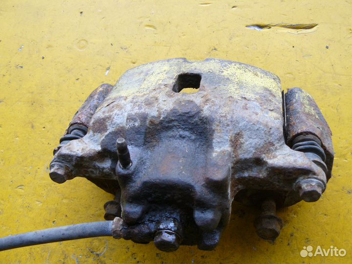 Суппорт передний левый для Mitsubishi Lancer 9