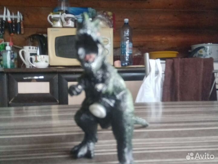 Динозавр игрушка