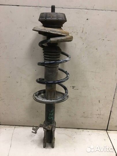 Амортизатор передний Nissan Almera