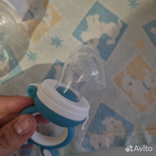 Молокоотсос, ниблер, контейнер, насадки для груди