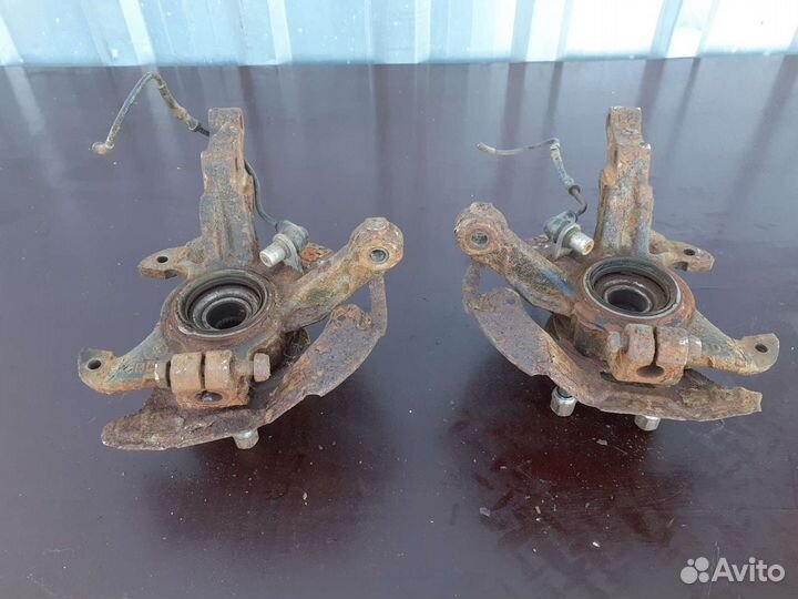 Кулак поворотный Мазда 323 f 94-98 г.в