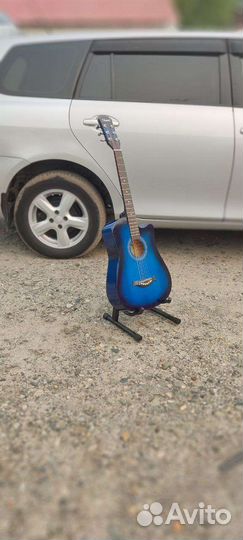 Гитара новая