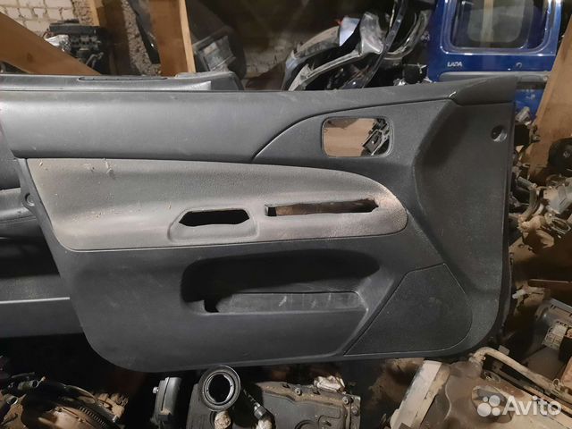 Обшивка двери Mitsubishi lancer 9