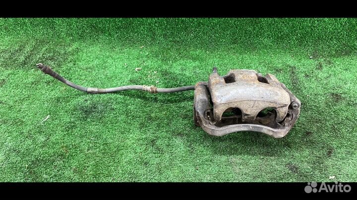 Суппорт тормозной передний правый Mazda CX-7