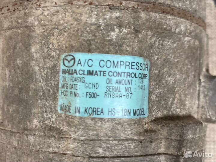 Компрессор кондиционера Mazda BBM461450C