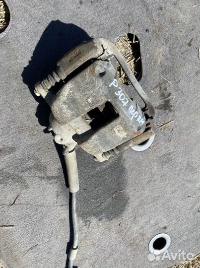 Тормозной суппорт Peugeot 307 SW диск