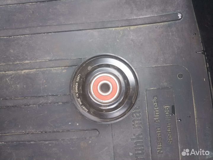 Натяжной ролик ремня генератора