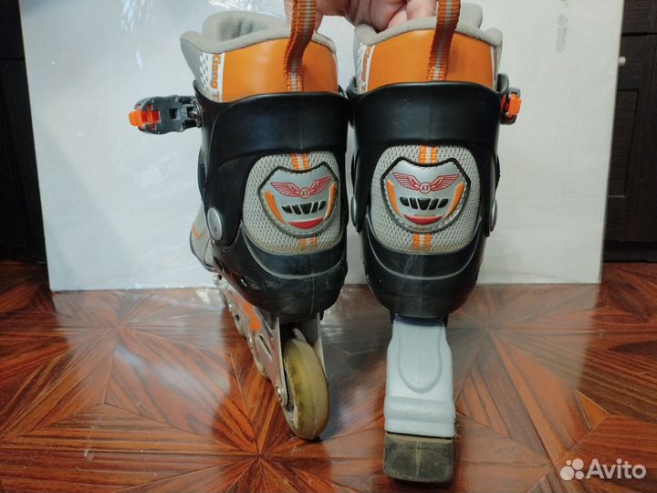 Роликовые коньки